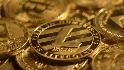 Close Up View of Ethereum Litecoin and Bitcoin. Gold Cryptocurrency Background Stock Footage 106706297