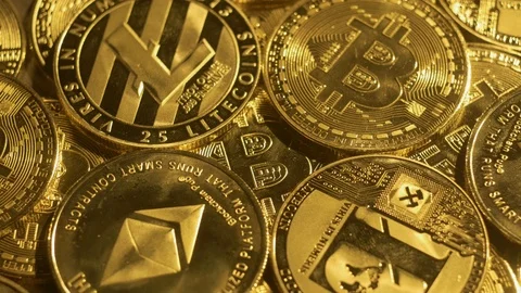 Close Up View of Ethereum Litecoin and Bitcoin. Gold Cryptocurrency Background Stock Footage 106706641
