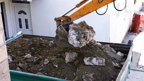 Up close view of excavator digging into the ground Stock Footage 121454170