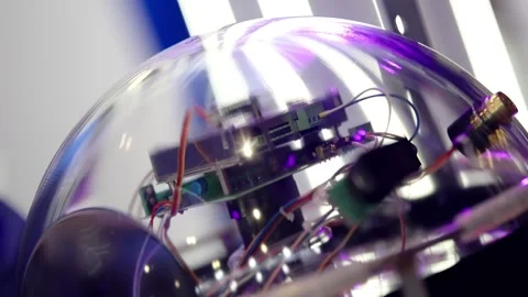 Close-up view of an experimental electronics prototype inside a transparent dome Stock Footage 325670313