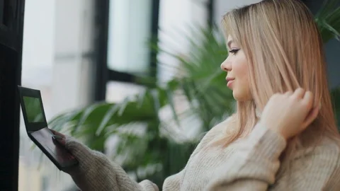 Close up view of extremely attractive young hot blonde woman checking her makeup Stock Footage 104563023