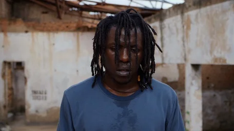 Close up view face of an athletic man with dread hair Stock Footage 117623413