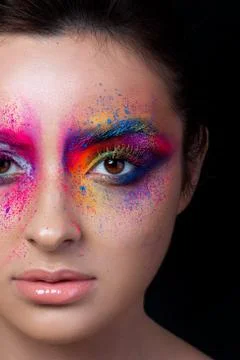 Close up view of face with multicolored makeup Stock Photos
