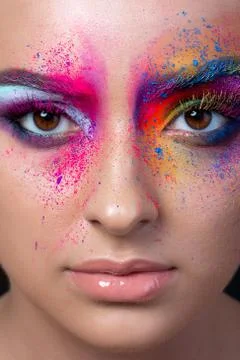 Close up view of face with multicolored makeup Stock Photos