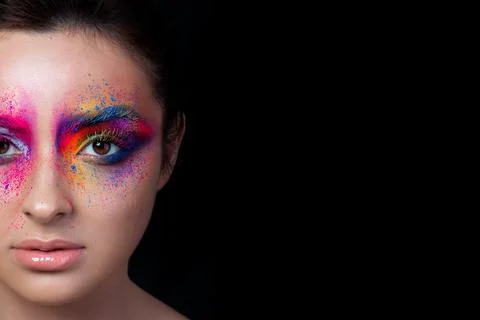 Close up view of face with multicolored makeup Stock Photos