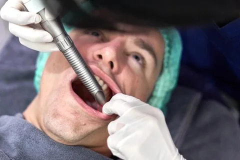 Close up view of the face of a patient getting a facial rejuvenation treatment Stock Photos