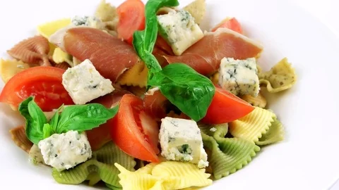 Close-up view of Farfalle bowtie pasta with blue cheese Stock Footage 73654693