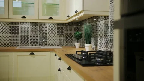 Close up view of fashion black and white wooden kitchen in the traditional Stock Footage