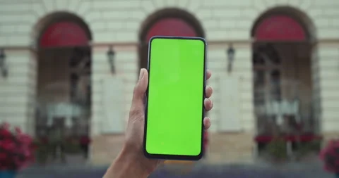Close up view of female hand holding smartphone with mockup blank screen Video stock 139979673
