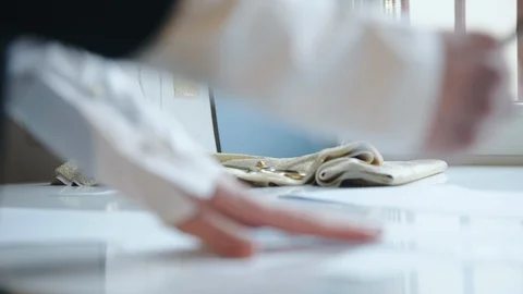 Close view of female hands drawing a dress pattern in atelier Stock Footage 105242863