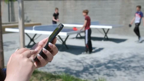 Close-up view of female hands holding smartphone, using the touchscreen Stock Footage 270962599
