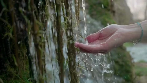 Close-up view of female hands touching water refreshing stream. earth, Pure Stock Footage 270407043