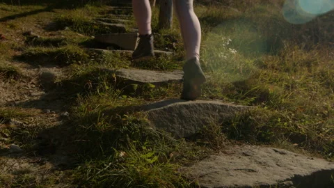 Close-up view of female runner legs. Running up the stairs outdoors. Sunny Video stock 167336751