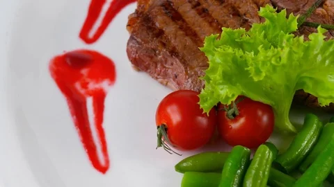 Close-up view of fillet steak plate with vegetables 動画素材 79710796
