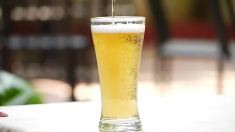 Close view of filling transparent glass with wine Stock Footage 148267341