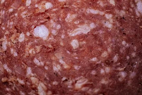 Close-up view of finely ground meat mixture with visible fat and texture, s.. Stock Photos
