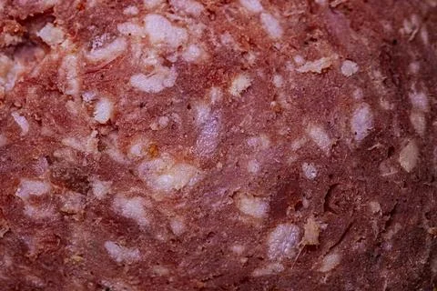 Close-up view of finely ground meat mixture with visible fat and texture, s.. Stock Photos
