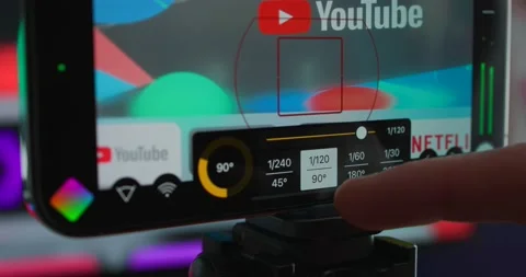 Close Up View Of Finger Checking Camera Video Settings On Iphone In Stock Footage 235908078