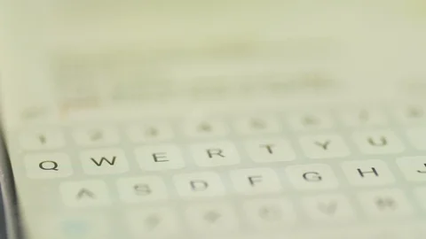 Close-up view fingers tapping keypad of smart phone and writing message on touch Vídeos de archivo 90497395