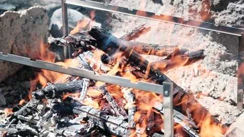 Close-up view of the fire, burning wood and empty grill, 4k Stock-Footage 145915473