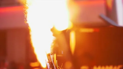 Close up view of fireworks exploding by a stage at night - Party Video stock 141488931