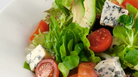 Close-up view of Fish salad, smoked salmon with cheese and vegetables Stock Footage 78189563