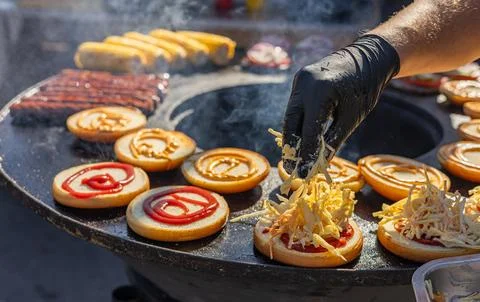 Close-up view of a flat top grill, showcasing the final stages of assembling  Stock Photos