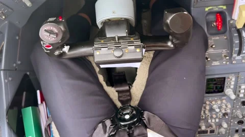Close-up View of the Flight Controls of a Jet Aiwrplane and the Captain Legs Stock Footage 331080529