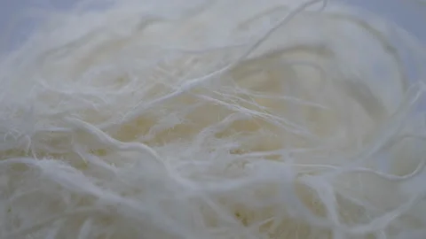 A close up view of floss halva with pistachio sprinkles. Stock Footage 152351116