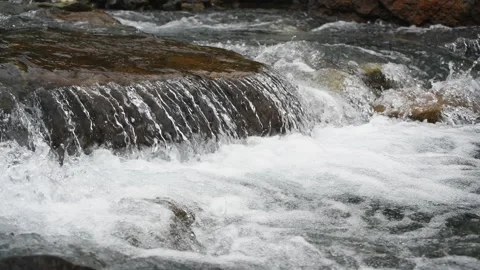 Close up view of flowing water in the mountain river. Stock Footage 141974248