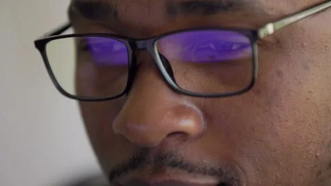 Close up view of focused Black African American businessman wears computer Stock Footage 250526793