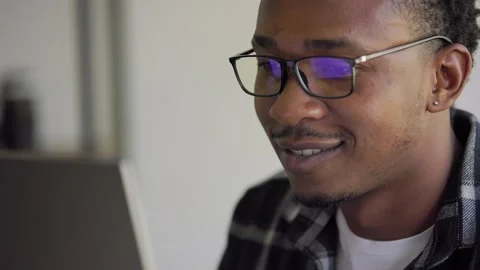 Close up view of focused Black African American businessman wears computer Stock Footage 250526958