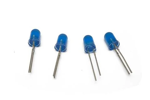 Close-up view of four blue LED (Light Emitting Diode) components Stock Photos