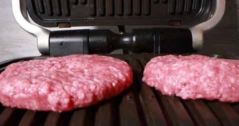 Close up view of fresh meat on electric grill 動画素材 165992851