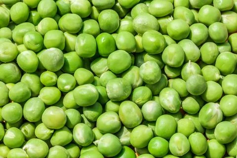 Close up view of fresh raw peas. Stock Photos