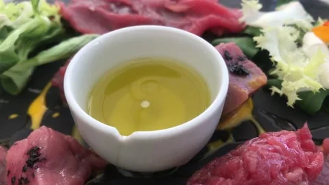 Close-Up View Of Fresh Raw Slices Of Meat With salad, Zoom out shot Stock Footage 136331175