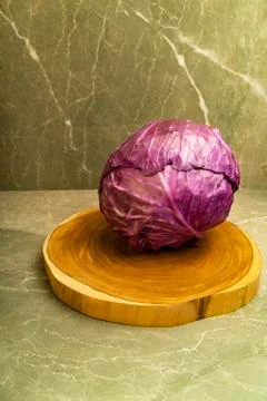 Close up view of fresh red cabbage on a wooden board Stock Photos