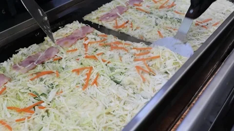Close-up View of Fresh Shredded Cabbage and Carrot Salad Preparation Stock Footage 331956127