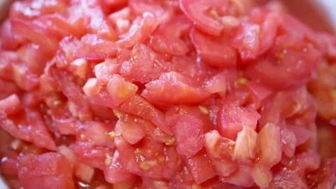 Close Up View Of Freshly Chopped Red Tomatoes Rotating 库存影片 330119245