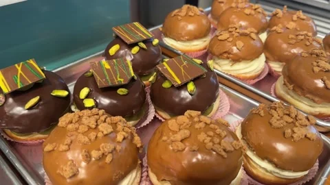 Close-up view of freshly made sufganiyot Stock Footage 295442896
