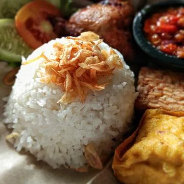 Close-up view of fried onion on top of rice Stock Photos