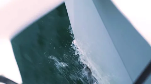 Close up view on the front of a fast moving sailboat in the sea. Video stock 136506633