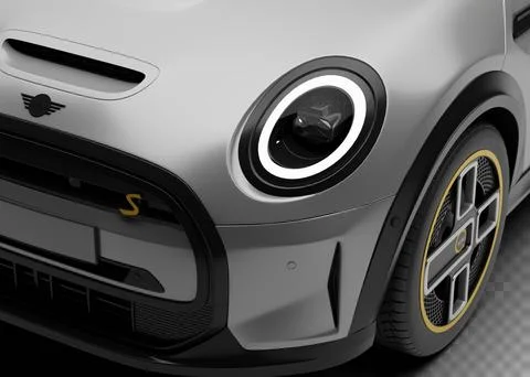 Close-up view of front headlight and red S logo on Mini Cooper SE Electric .. Stock Illustration