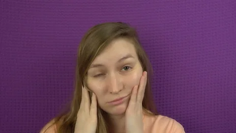 Close up view in front of the mirror of sleepy exhausted face in an early mornin Stock Footage 100602118