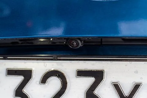 Close up view of front parking assist video camera on the car. Front view cam Stock Photos