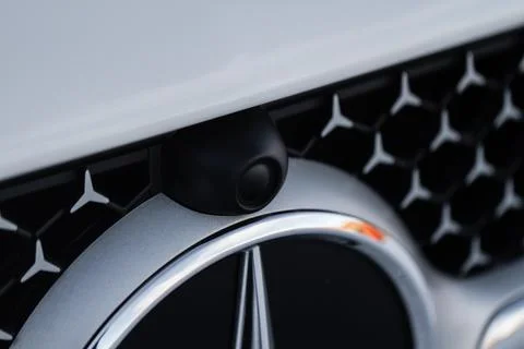 Close up view of front parking assist video camera on the car. Front view cam Stock Photos