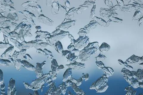 Close up view of frozen ice patterns on a glass window Stock Photos