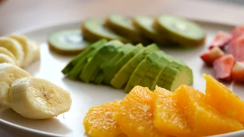 Close-up view of fruit plate rotating counterclockwise Stock Footage 272307025