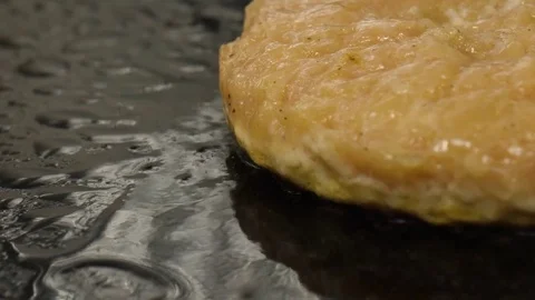 Close-up view of frying chicken burger cutlet in the oil, 4K 60 FPS Stock Footage 76897725