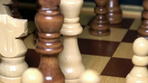 Close-up view of a game of chess in which the white player gives up Video stock 168820439